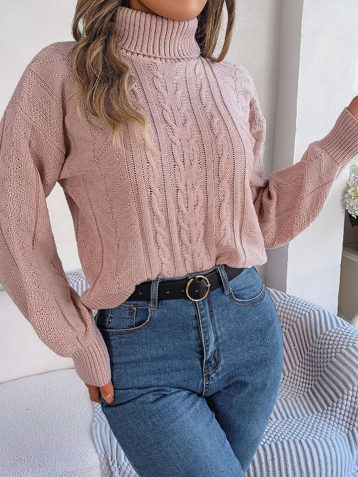 Cable-knit roll neck jumper