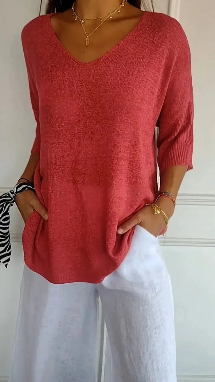 Red relaxed v-neck knit top