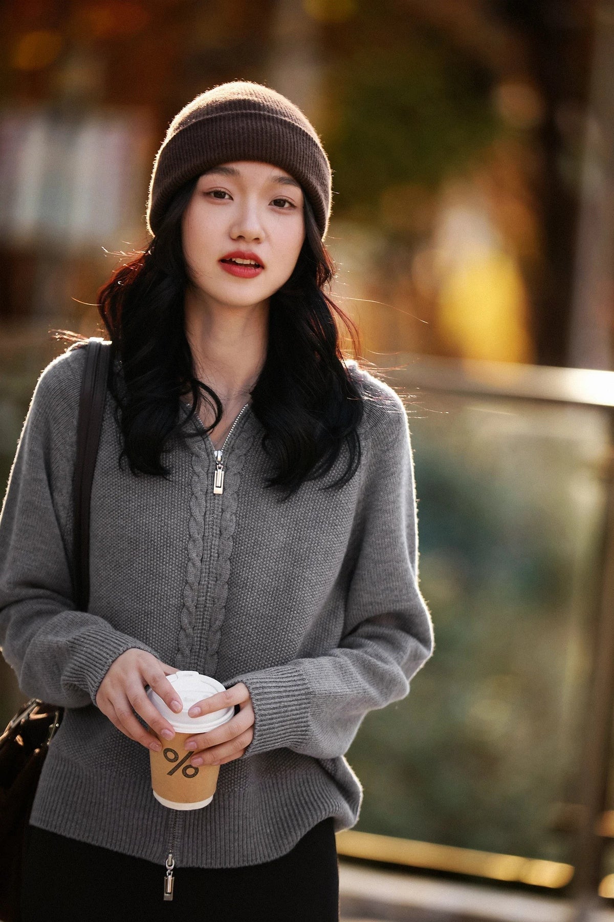 Gray zip-up cable knit cardigan