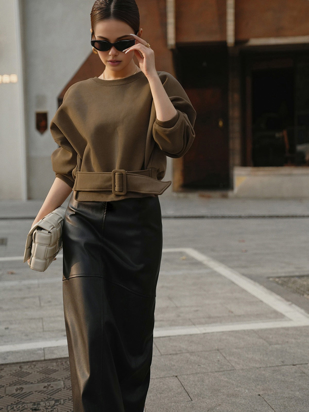 Belted sweatshirt top