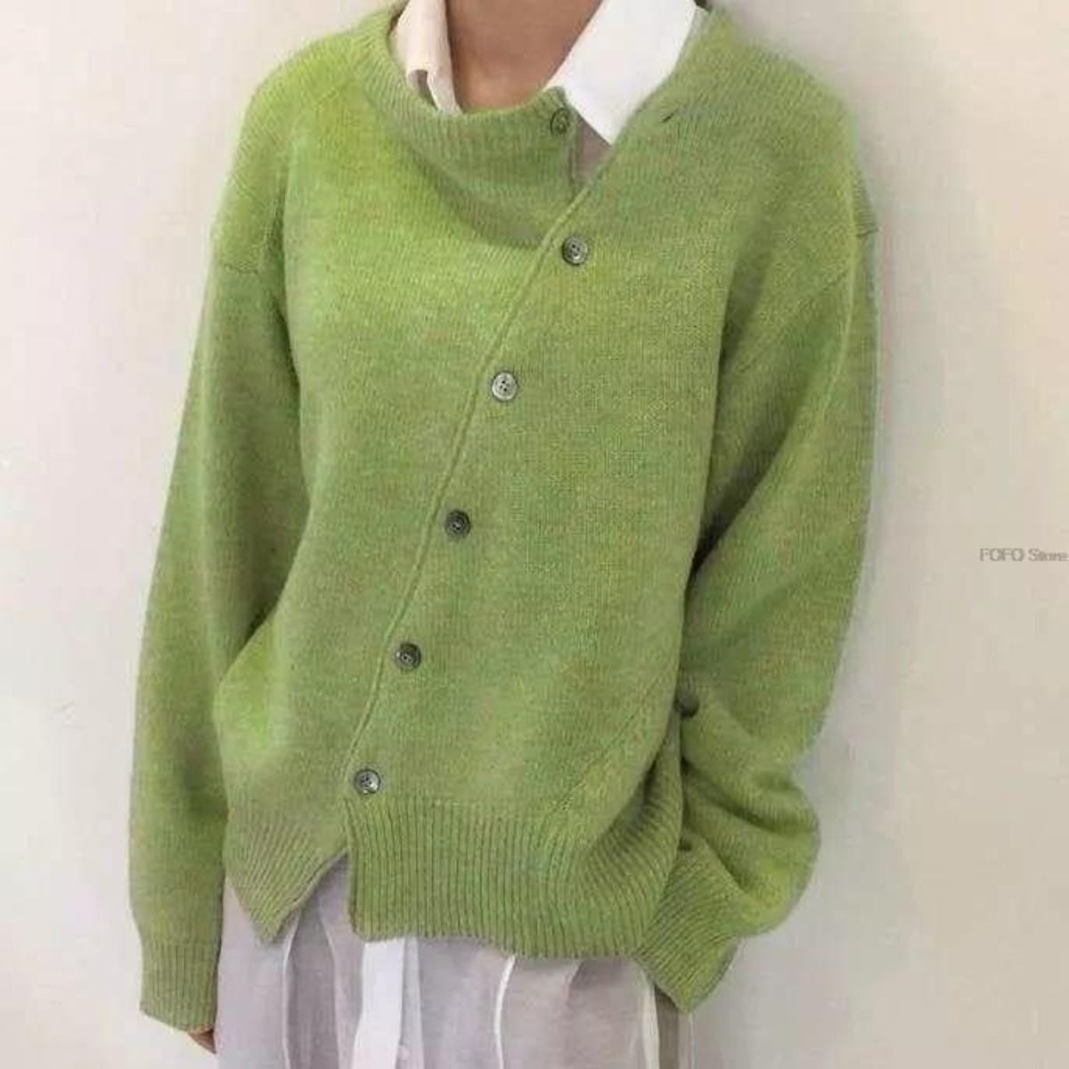 Green button-front knit cardigan