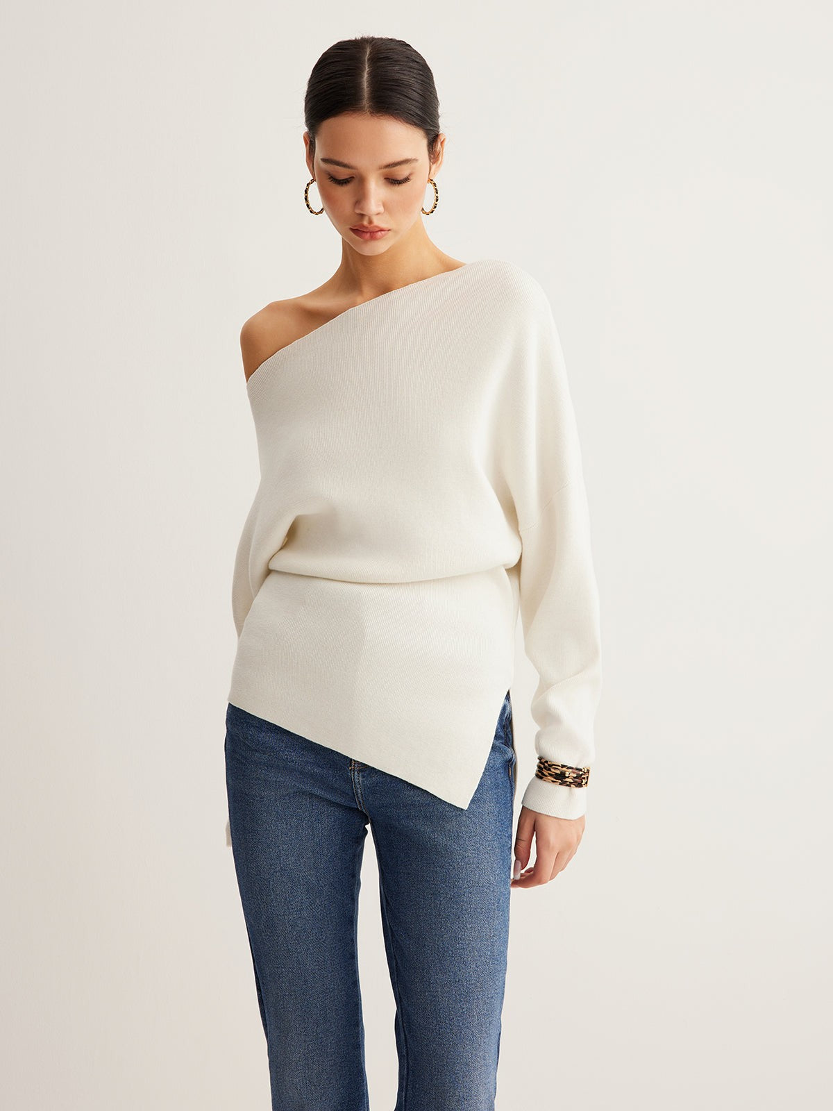 White merino wool one-shoulder jumper