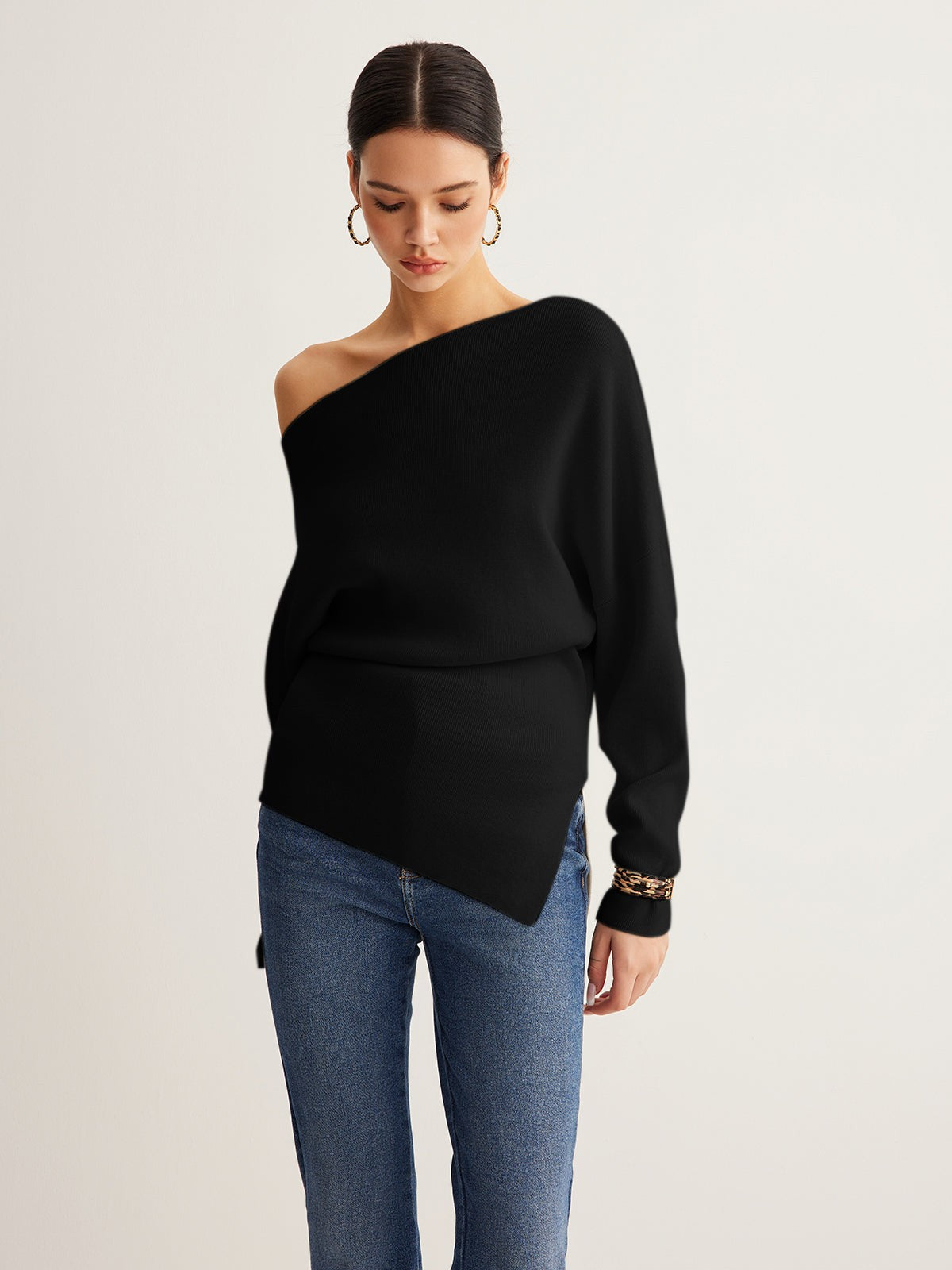 Black merino wool one-shoulder jumper