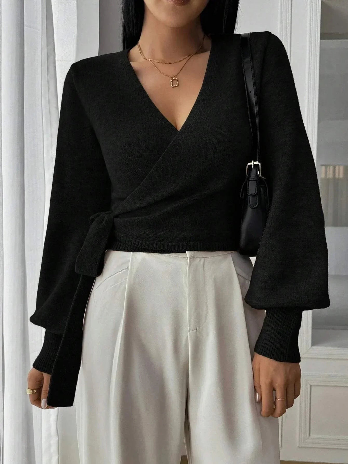Black tie-waist wrap knit top