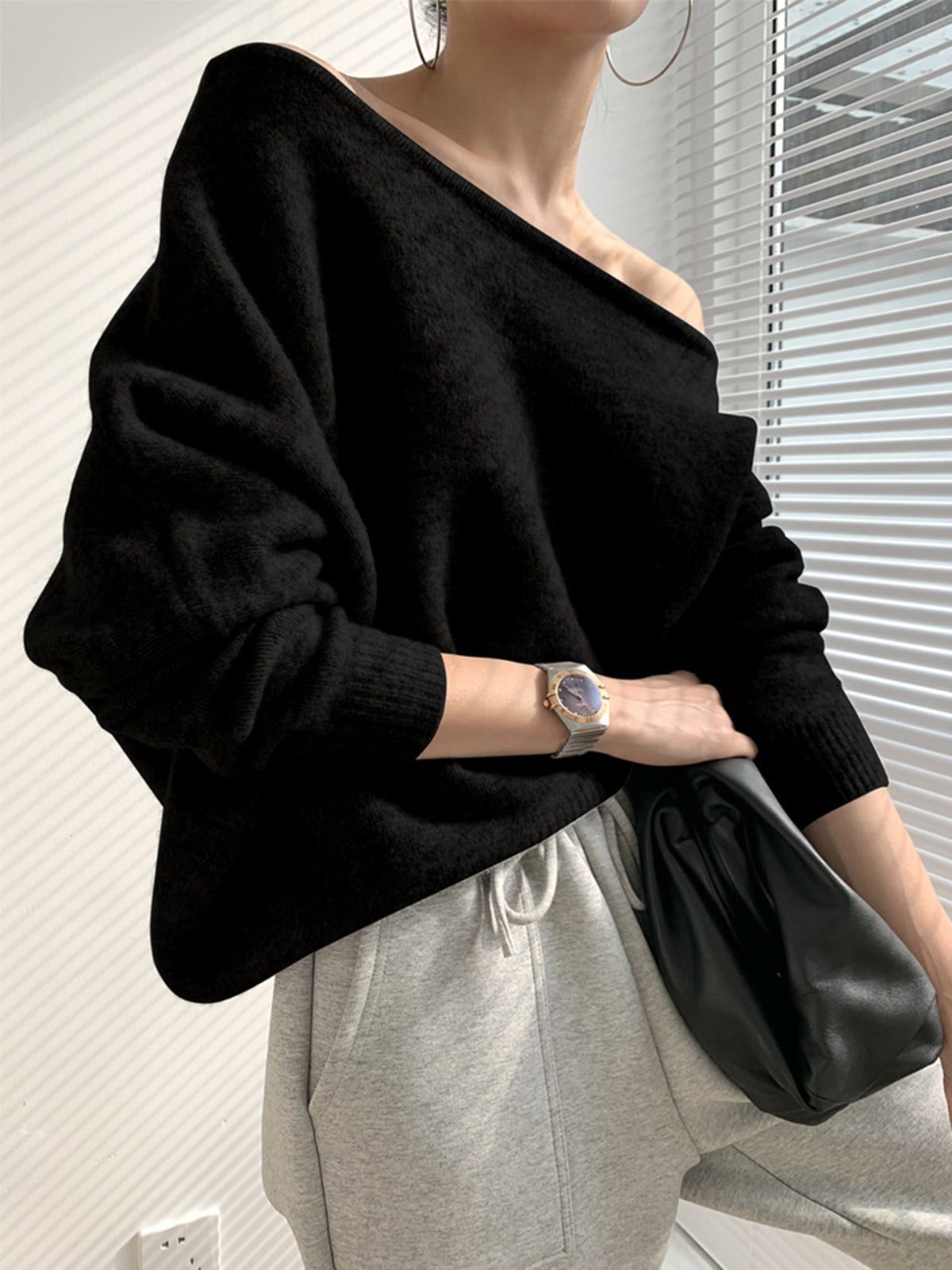 Black wool off-shoulder jumper